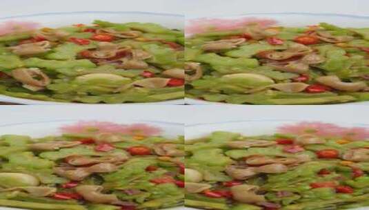 苦瓜炒肥肠中餐菜品高清在线视频素材下载