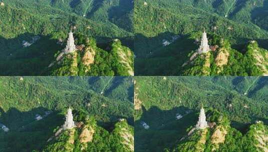 航拍千山绿色山林和大佛寺塔高清在线视频素材下载