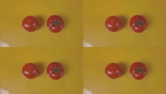 两个番茄被水冲高清在线视频素材下载