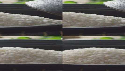 2K竖屏在石锅里展示的大米摇移画面高清在线视频素材下载