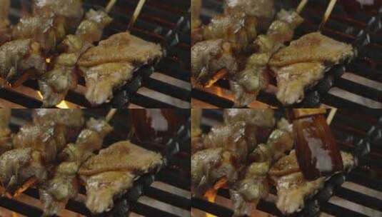 2K高速摄影烤网上的烤肉刷酱高清在线视频素材下载