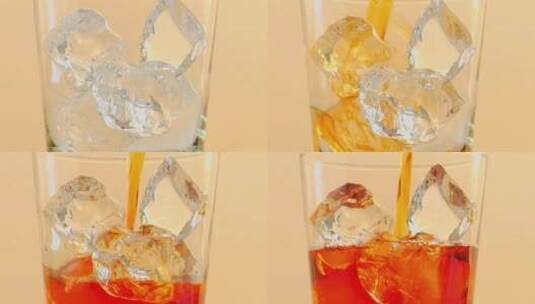 饮料倒入加冰的玻璃杯高清在线视频素材下载