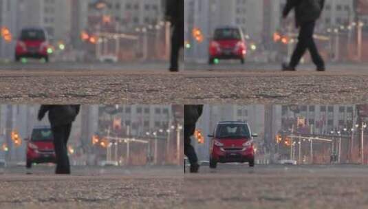 一名男子驾驶一辆汽车穿过街道高清在线视频素材下载