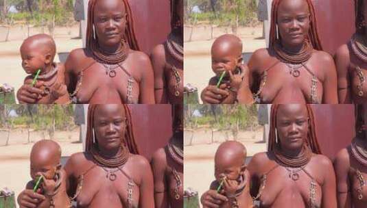 非洲妇女抱着孩子的肖像高清在线视频素材下载