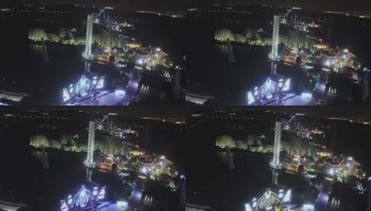 航拍上海欢乐谷游乐设施夜景灯光秀高清在线视频素材下载
