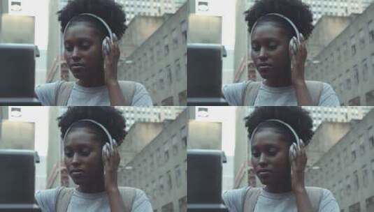黑人女孩带着耳麦高清在线视频素材下载