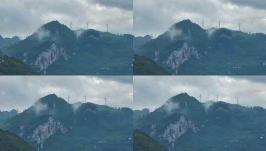 群山中的高压线塔高清在线视频素材下载