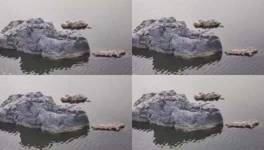 湖上孤独的礁石高清在线视频素材下载