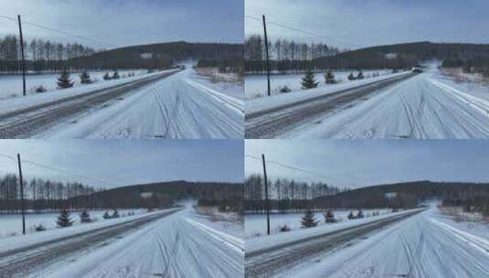 寒冷冬天行驶在冰雪道路上的汽车高清在线视频素材下载