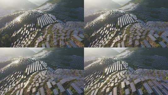 新能源太阳能光伏发电站山坡航拍高清在线视频素材下载
