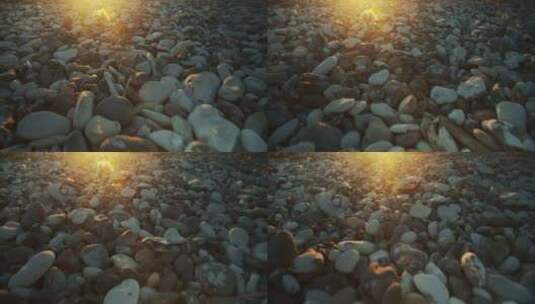 日落时的石滩鹅卵石高清在线视频素材下载
