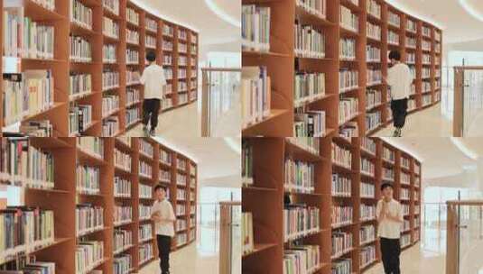 中国小男孩在图书馆搜寻书籍高清在线视频素材下载