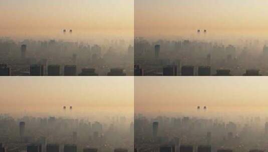 中国河南郑州清晨日出晨雾城市风光航拍高清在线视频素材下载