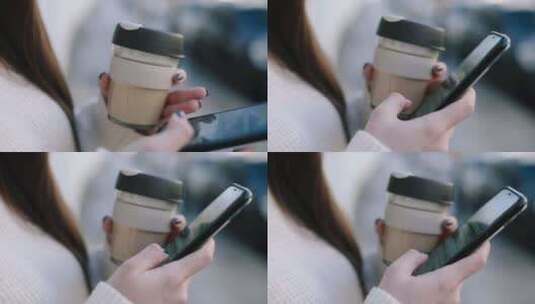 女生捧着咖啡杯玩手机高清在线视频素材下载