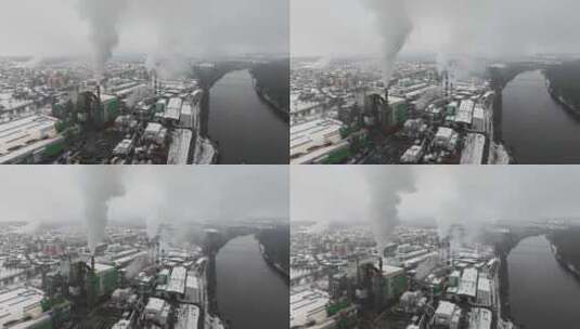 冬季工厂烟囱排放烟雾高清在线视频素材下载