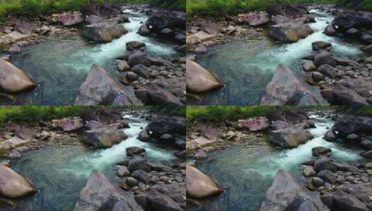 航拍武夷山桐木溪峡谷森林中的清澈溪流岩石高清在线视频素材下载