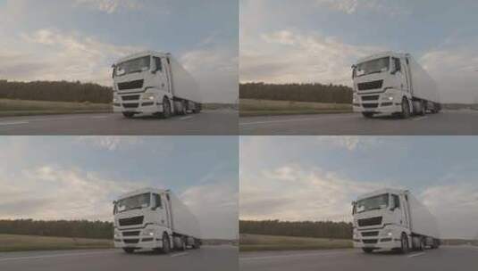 白色卡车，拖车在公路上行驶，货物运输高清在线视频素材下载