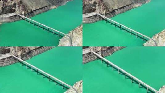 汽车行驶在桥梁上 新疆塔县班迪尔湖航拍高清在线视频素材下载