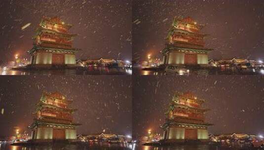 山西大同古城鼓楼夜景飘雪下雨雪景高清在线视频素材下载