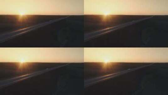 夕阳下在乡间公路上行驶的汽车高清在线视频素材下载