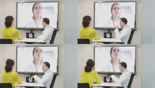 医生开视频会议讨论病人病情高清在线视频素材下载