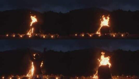 夜幕下进行篝火祈福的人高清在线视频素材下载