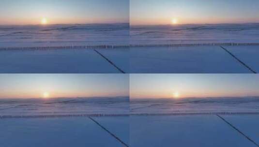 航拍呼伦贝尔冬季雪原田野夕阳高清在线视频素材下载