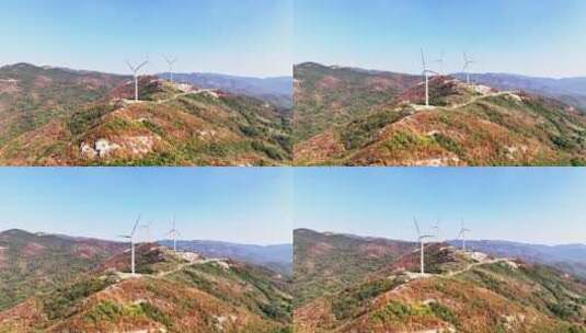 4K山顶上转动的发电风车高清在线视频素材下载