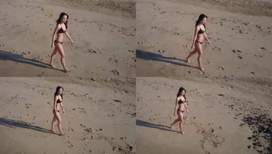 女人在沙滩上行走高清在线视频素材下载