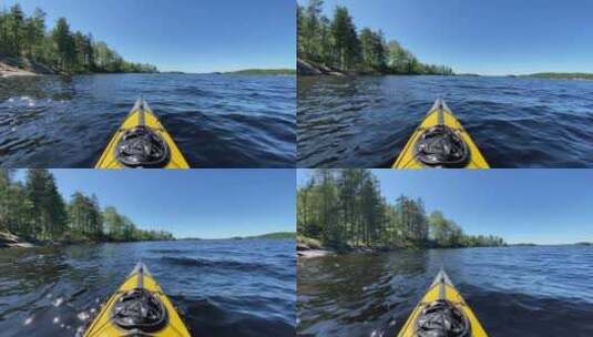 皮划艇沿着宁静的湖水航行高清在线视频素材下载