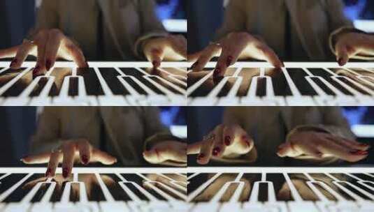 女子在夜光模拟钢琴键盘上演奏高清在线视频素材下载