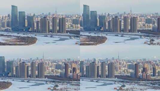 中国黑龙江哈尔滨松冬天市区雪景航拍高清在线视频素材下载