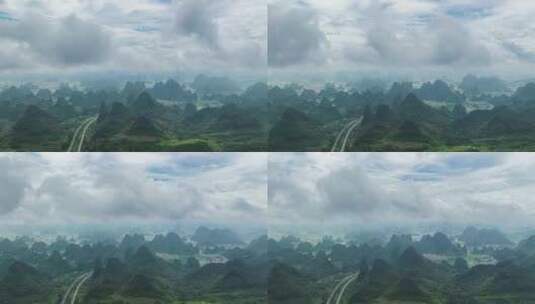 阳光下穿行在桂林喀斯特山峰间的高速公路高清在线视频素材下载