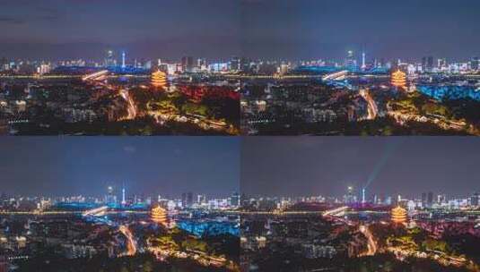 夜景中的黄鹤楼与城市建筑群高清在线视频素材下载