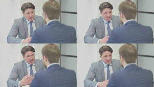 商人在办公室与客户交谈高清在线视频素材下载