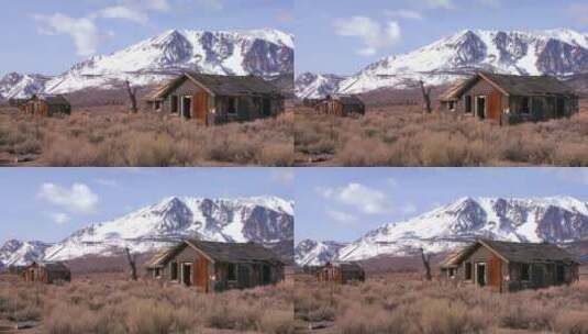 白雪覆盖的山脉与废弃小屋的时间流逝高清在线视频素材下载