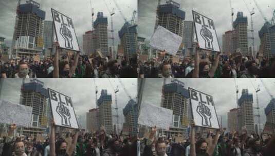 伦敦抗议者呐喊举起拳头标志高清在线视频素材下载