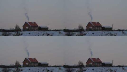 内蒙古阿尔山冬季山里人家炊烟袅袅高清在线视频素材下载