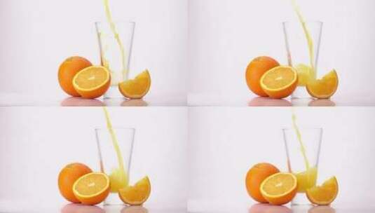 把橙汁倒进玻璃杯里高清在线视频素材下载