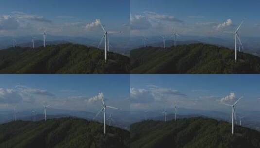 航拍蓝天白云下的风电场高清在线视频素材下载
