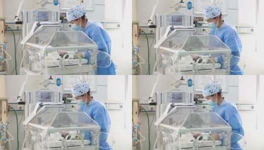 新生儿护理重症监护病房护士婴儿保温箱ICU高清在线视频素材下载