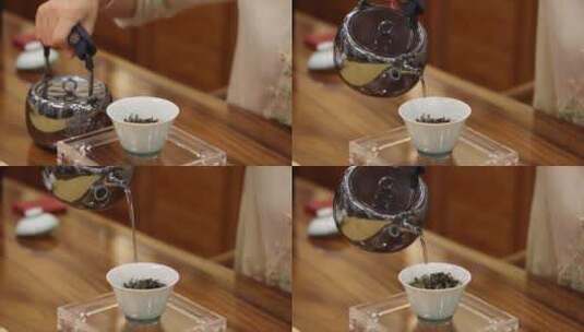 美女往茶杯里倒水冲茶的慢动作实拍素材高清在线视频素材下载