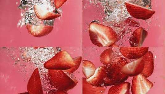 掉入水中的草莓特写高清在线视频素材下载