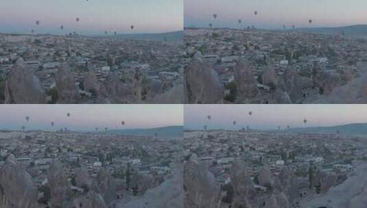 美丽的村庄上空的热气球高清在线视频素材下载