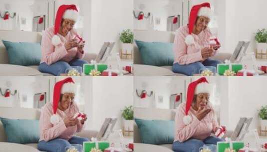 妇女在圣诞节进行视频通话高清在线视频素材下载