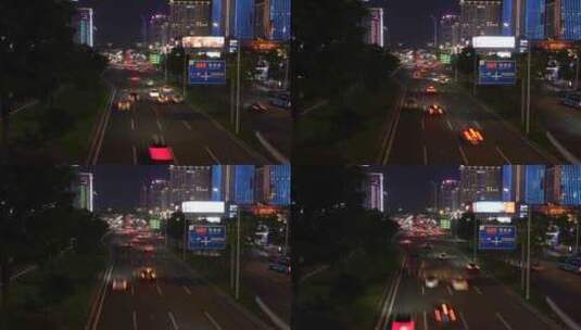 夜晚城市道路车来车往实拍高清在线视频素材下载