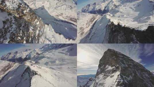 FPV航拍雪山雪景高原森林山顶阳光云自然高清在线视频素材下载