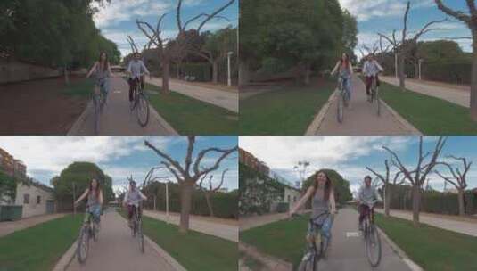 男人和女人在自行车道上骑自行车高清在线视频素材下载