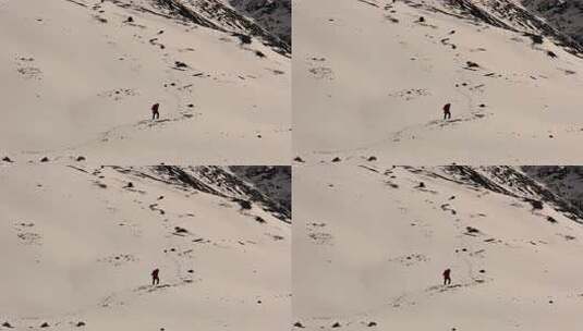 攀登岷山山脉主峰雪宝顶雪山的登山队高清在线视频素材下载