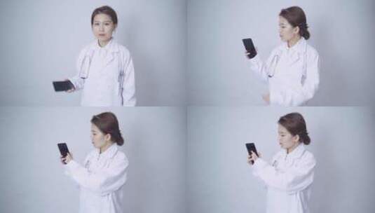 一位年轻女性医生操作手机界面展示模板高清在线视频素材下载